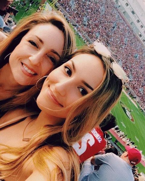 Cheering on the Seminoles Together Family spending time at the FSU football game
